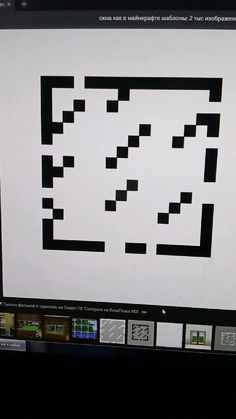 a computer screen with some black and white squares on it