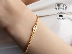 Introducing our 14K Gold Evil Eye Bracelet, a stunning piece of evil eye jewelry that is sure to mesmerize. With its delicate and dainty design, this bracelet is perfect for adding a touch of elegance to any outfit. Crafted with a Cuban link chain, it effortlessly combines style and sophistication. Whether it's a dainty gift for her or a special Maid of Honor gift, this bracelet is a symbol of protection and positive energy. Embrace the power of the evil eye with this beautiful accessory. 🍀 Mat Dainty Yellow Gold Evil Eye Bracelet Gift, Elegant 14k Gold Evil Eye Bracelet Gift, Gold Metal Evil Eye Bracelet For Gift, Cheap Gold Evil Eye Hand-strung Bracelet, Gold-plated Evil Eye Bracelet With Adjustable Chain, Evil Eye Design, Christmas Gifts For Grandma, Christmas Gifts For Him, Maid Of Honour Gifts