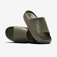 Enjoy a calm, comfortable experience—no matter where your day off takes you. Made with soft yet supportive foam, the minimal design makes these slides easy to style with or without socks. And they’ve got a textured footbed to help keep your feet in place. Slides Nike, Nike Brown, Men Slippers, Nike Slides, Men Slides, Mens Slides, Buy List, Black Slides, Beach Wear Men