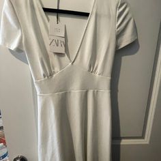 New With Tag: Zara White Summery Mini Dress. Never Worn, Size Medium White Stretch Short Sleeve Dress, White Stretch A-line Midi Dress, White A-line Midi Dress With Stretch, Zara Short-sleeved Stretch Midi Dress, Zara Stretch Midi Dress With Short Sleeves, Zara Stretch V-neck Midi Dress, Zara Stretch Midi Dress With V-neck, Zara White Dress, Zara White