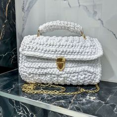 White Bag size  Length: 26cm Height /depth/: 16 cm Width: 6 cm Bottom size: 25cm/5 cm Long handle size: 114 cm It can be made in different size and colour if you would like. Presenting a harmony of modern design and timeless craft, this stylish female knitted bag is a true piece of artisanal fashion. Versatile for every season and occasion, it's crafted from premium materials that promise durability and longevity. The bag's knitted pattern provides a unique texture contrast that catches the eye Artisanal Fashion, Texture Contrast, Crochet White, Artisan Fashion, Knitted Bag, Modern Bag, Coffee With Friends, Bag Stand, Designer Bag