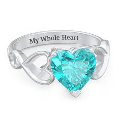 Sterling Silver Heart Shaped Stone with Interwoven Heart Infinity Band Ring and Mint Premium Zirconia Stone | Jewlr Birthstone Colors Chart, Colors Chart, Infinity Band Ring, Infinity Band, Wedding Romantic, Mens Engagement, Infinity Heart, Birthstone Colors, Crystal Figurines