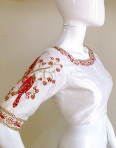 Pure raw silk white blouse with gorgeous bird embroidery on the sleeves. Custom fitted. -Measurements sheet will be sent to you once you order( Standard sizing also available) -Custom colors available -Work on front, back and sleeves. Please convo me if you're have any specific requirements. Raw Silk Blouse, Silk Shirt Blouses, Zardosi Embroidery, Embroidery Blouses, Brocade Skirt, Choli Blouse, Embroidery Online, Blouse Embroidery, Saree Blouses