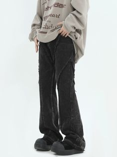 Experience effortless style with our Distressed Crinkle Texture Wide Leg Pants, where comfort meets timeless fashion. These pants are designed with a discerning eye for detail, featuring a robust denim fabric that speaks to durability and a crinkle texture that adds an edgy appeal. The non-stretch, high waist fit is paired with a tasteful distressing process, giving these pants a unique personality that stands out in a crowd. With a focus on craftsmanship, the pants sport a washed look adorned w Grunge Wide Leg Distressed Pants, Baggy Distressed Washed Black Pants, Distressed Stretch Wide Leg Pants, Wide Leg Stretch Distressed Pants, Stretch Wide Leg Distressed Pants, Distressed Grunge Pants With Relaxed Fit, Distressed Stretch Straight Leg Pants, Baggy Wide-leg Ripped Pants, Distressed Baggy Straight Leg Pants