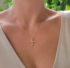 Crystal decor cross pendant necklace. Wear it on it's own or layer it.  Pendant details:  * Material: non tarnish gold filled, cubic zircon * Measurements: 1'H 0.5'W Chain: non tarnish gold filled Comes in our gift ready packaging: vegan leather pouch for safe jewelry storing and branded box  GOLD FILLED Tarnish Resistant. Hypoallergenic. Long Lasting. Gold filled is affordable alternative to solid gold. Hypoallergenic - sensitive skin friendly. With proper care it will last for years. What is G Cheap Gold Cross Necklace As Gift, Cross Necklace Gold, Gold Cross Necklace, Confirmation Gifts, Crystal Decor, Chain Gold, Gold Cross, Cross Pendant Necklace, Gift For Friend