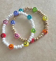 New to BaeKCreations these cute little smiley beaded bracelets.  Bracelets are made out of 4 mm glass and acrylic beads strong on elastic cord. Care should be used to avoid necessary overstretching Do not expose your bracelets to water or leave out in direct sunlight All of our bracelets made with natural products will very slightly in coloring and markings. Each one is unique in its own way. We make sure that every effort has been made to ensure the strongest and best materials were used howeve Beaded Bracelets With Smiley Face, Little Miss Bracelets, Smiley Bracelet, Face Jewelry, Kids Bracelet, Face Jewellery, Toddler Gift, Kids Bracelets, Birthday Gifts For Kids