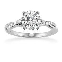 This engagement ring is the perfect combination of classic and contemporary with a band that blends natural diamond pavé with a meaningful infinity shape. Crafted in bright 14-karat white gold  it also features milgrain detailing for a delicate finishing touch. For more information on selecting your center stone  live chat online  call a customer service representative at 1-866-467-4263  or visit one of our store locations. Modern White Diamond Wedding Ring, Classic Infinity Diamond Wedding Ring, Modern Diamond Ring With Diamond Accents, Elegant Infinity Diamond Wedding Ring, White Gold Infinity Jewelry With Brilliant Cut, Elegant Infinity Diamond Ring With Accents, Classic Infinity Diamond Ring For Anniversary, Elegant Infinity Diamond Ring With Brilliant Cut, Classic Diamond Infinity Ring