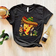 Happy Cinco De Mayo Pizza Shirt, Mexican Pizza Slice Shirt Casual Cotton Shirt For Cinco De Mayo, Casual Short Sleeve Shirt For Cinco De Mayo, Cinco De Mayo Graphic Cotton T-shirt, Casual Multicolor Shirt For Cinco De Mayo, Cotton Graphic Tee For Cinco De Mayo, Black Crew Neck T-shirt For Cinco De Mayo, Cinco De Mayo Funny Print Crew Neck T-shirt, Casual Cinco De Mayo T-shirt With Funny Print, Casual Graphic Print Tops For Cinco De Mayo