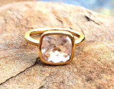 April Birthday, April Birthstone Ring, Clear Stackable Ring, Square April Ring, Gold Clear Crystal Ring, April Birthstone Jewelry The square, cushion cut stackable ring has a gem size of 9mm. The finish is vermeil, 24kt. Gold over a Sterling Silver base. More gemstone rings in my store: https://www.etsy.com/shop/PhaedoraJDesigns?section_id=17141549&ref=shopsection_leftnav_4 Crystal Ring With Rectangular Gemstone For Gift, Rectangular Gemstone Crystal Ring Gift, Rectangular Crystal Gemstone Ring For Gift, Adjustable Topaz Birthstone Ring Gift, Gold Topaz Ring With Rectangular Stone For Gift, Blue Topaz Ring For Gift, Adjustable Ring With Rectangular Stone For Gift, Adjustable Crystal Ring With Large Stone For Gift, Gold Topaz Ring With Large Stone As Gift