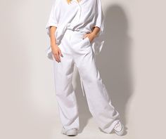 Linen Pants, Wide Leg Pants, White Pants Classic linen trousers in elongated straight leg silhouette: |FIGI| GARMENT FEATURES: *Timeless piece for every wardrobe *Clean, minimalistic design *Elongated straight leg silhouette *Practical side pockets *Invisible back zip fly *Back darts, one on each side *Made from quality linen fabric COLOUR OPTIONS: This product is available in the following colour options: -black; -white; -beige; -dark navy. SIZE & FIT: Model is 175cm and wears size S. COMPO Chic Oversized Straight Leg Bottoms, Oversized White Straight Leg Bottoms, Oversized White Chic Bottoms, Chic Oversized White Bottoms, Oversized High-waisted Spring Pants, Oversized High-waisted Pants For Spring, Oversized High-waisted Lounge Pants, Oversized High-waisted Pants For Loungewear, Oversized White Bottoms For Workwear