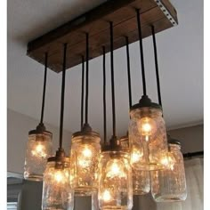 mason jar chandelier hanging from the ceiling