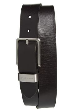 Polished leather defines a handsome belt with a sleek buckle that lends eye-catching shine. Leather Imported Modern Business Belts, Modern Leather Belts With Buckle Closure, Modern Leather Belt With Buckle Closure, Black Formal Belt With Buckle Closure, Formal Black Belt With Buckle Closure, Modern Leather Business Belt, Sleek Leather Belt Buckles For Workwear, Black Leather Strap Belts For Formal Occasions, Sleek Black Belt Buckles For Business