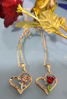 Special for you. We offer free shipping with the purchase of 35 dollars or more! with First Class Mail (Not Priority Mail) 14k Gold Plated Rose Flower & Heart Necklace  ~ Rosa y Corazon Dije + Cadena ~ Gold Plated Rose Flower Jewelry. Rose Flower & Heart  Necklace. Special Mother's Day, Valentine's Day, Easter, Christmas, or any holiday! Gorgeous Rose Pendant + Chain *14k Gold Plated *Includes 18,20,22,24 inches valentine chain Material: Copper Measurements: Chain - 11.5 inch. from top to bottom Valentine's Day Rose Design Necklace For Party, Valentine's Day Rose Design Party Jewelry, Heart-shaped Rose Design Necklace For Valentine's Day, Rose Design Jewelry For Valentine's Day Gift, Valentine's Day Rose Design Jewelry Gift, Valentine's Day Rose Jewelry Gift, Rose Detail Necklaces For Valentine's Day Anniversary, Roses Necklaces For Valentine's Day Anniversary, Anniversary Rose Necklaces For Valentine's Day