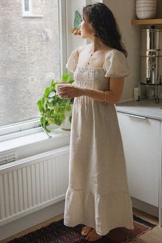 Style // That perfect neutral for any occasion, Moon is our perfect creamy off white linen dress The Soller Dress is a feminine, flirty and fun dress for any occasion. A midi to long dress with a tiered skirt, the square neckline and puffed sleeves make it a dreamy addition to any wardrobe. It features and elastic bodice and tie detailing on the back to ensure the best possible fit. The dress has some structure while leaving plenty of room for comfort and ease, for an effortless approach to dres Linen Midi Dress With Ruffle Hem, Cream Puff Sleeve Dress With Ruffles And Square Neck, Square Neck Midi Dress With Ruffle Hem For Brunch, Tiered Linen Midi Dress With Ruffles, Tiered Ruffle Linen Midi Dress, Linen Puff Sleeve Dress With Ruffles, Beige Puff Sleeve Dress With Ruffles For Brunch, Feminine Cream Midi Dress With Square Neck, Feminine Cream Square Neck Midi Dress