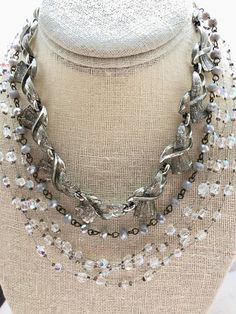 "Offering a gorgeous assemblage made up of a vintage Coro, vintage Carol Lee necklaces and added grey rosary crystal chain. This is a real authentic vintage piece - not \"vintage inspired\" or Made in China replica - it's the real deal! An educated guess dates the two centerpiece necklaces from at least as far back as 1960's. Just look at the style - definitely not made like this anymore. The silver Coro necklace has mellowed which is why I paired it with grey components. All crystals are shiny. Crystal Collage, Collage Necklace, Wedding Art Deco, Rhinestone Belt Buckle, Art Deco Silver, Assemblage Necklace, Halloween Necklace, Vintage Repurposed, Butterfly Graphic