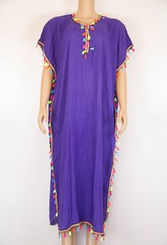 "Indulge in the elegance of our Bohemian Moroccan Kaftan Dress collection, featuring exquisite designs perfect for any occasion. Whether you're looking for a casual dress, party dress, wedding dress, or even a maternity dress, our kaftans are designed to make you feel effortlessly stylish. Beautiful pink moroccan kaftan for women with embroidery and stripes. This oriental dress is handmade in soft fabric cotton which is very pleasant to wear. Its shape and its length refine the silhouette. Perfect for summer days or special events, our long maxi dresses offer both comfort and style. Embrace the relaxed yet chic bohemian vibe, making a fashion statement wherever you go. From beach getaways to garden parties, our kaftans are versatile and eye-catching. Traditional Moroccan Kaftan Dress - The Bohemian Gown For Festivals, Bohemian Floor-length Kaftan For Traditional Ceremonies, Bohemian Multicolor Gown For Eid, Summer Purple Maxi Length Gown, Purple Short Sleeve Maxi Dress For Wedding, Long Festive Dress With Tassels, Long Festive Dresses With Tassels, Festive Long Dress With Tassels, Bollywood Style Tunic Dress For Festival