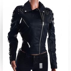 Women’s Members Only Faux Leather Biker Jacket-Black This Women’s Studded Vegan Leather Jacket Features A Signature Moto Jacket Fit With Studs On The Shoulder And Stitching Detail Of Braid Lacing Up The Sleeves. Fold Over Collar Asymmetrical Zip Closure 20″ Length Front Zip Closure Notched Collar Long Sleeves Chest And Side Zip Pockets Lined 100% Polyurethane Spot Clean Imported True To Size Spring Punk Biker Jacket With Rivets, Fitted Spring Outerwear With Rivets, Trendy Long Sleeve Leather Jacket With Rivets, Punk Faux Leather Biker Jacket With Zipper, Casual Fall Biker Jacket With Rivets, Punk Faux Leather Biker Jacket For Fall, Fall Punk Faux Leather Biker Jacket, Casual Biker Jacket With Rivets For Fall, Trendy Winter Biker Jacket With Rivets