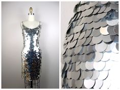 "This is a STUNNING little dress fully embellished with reflective mirror silver paillette sequins all over! It's in perfect condition! Bust - 32-34\" Waist - 26-28\" Hips - 36-38\" Length - 37\" This dress comes from a pet-free and smoke-free home. If you would like more info or have any questions, please don't hesitate to ask!" Silver Fitted Sequin Fabric For Glamorous Look, Fitted Silver Sequin Fabric For Party Season, Silver Sequin Fabric For Cocktail Party Season, Silver Shiny Disco Dress, Fitted Silver Sequin Fabric For Cocktail, Sleeveless Embellished Disco Dress, Silver Fitted Disco Sequin Dress, Fitted Silver Sequin Dress With Contrast Sequins, Silver Fitted Sequin Disco Dress