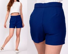 "Vintage 70s royal blue high waisted shorts with buttoned pockets. Measurements and Condition:  Fits like: Labeled vintage size 10, fits modern women's XS to petite small Fabric: Polyester Brand: Satisfaction Always by Kmart Condition: Very good, with a small snag to the lower right of the zipper placket. Waist: 25.5\" Hips: 36\" to 36.5\" - taken at the bottom of the zipper opening Rise: 11.75\" Inseam: 2.5\" Shown on a 5'5\" model with measurements of 32\"-21\"-32\", usually wears size petite Zipper Placket, High Waisted Shorts, Vintage 70s, Modern Woman, Short Sets, Women's Shorts, Royal Blue, Short Dresses, High Rise