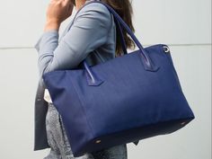 I need this Dagne Dover tote! It was made for me, being so organized! Chic Top Handle Weekender Bag For Shopping, Chic Tote Weekender Bag With Handles, Luxury Shopping Tote Travel Bag, Chic Travel Tote Bag With Top Carry Handle, Luxury Everyday Tote Weekender Bag, Elegant Weekender Shoulder Bag For Shopping, Elegant Weekender Bag With Leather Handles For Shopping, Elegant Top Handle Weekender Bag For Shopping, Chic Travel Bag With Double Handle For Shopping