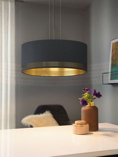 The Esteperra three light hanging pendant features a circular ceiling plate in a black finish, holding a drum shaped, black decorative fabric shade with gold lining. This stunning design will be a striking display for modern or contemporary decors. The pendant also features a gold design around the black exterior of the shade. The black hanging cord is fully adjustable for various hanging positions. EGLO Esteperra 3-Light Black Transitional Drum Medium Hanging Pendant Light | 99274A Spot Plafond, 3 Light Chandelier, 3 Light Pendant, Drum Chandelier, Dimmable Lamp, Black Pendant Light, Gold Fabric, Black Chandelier, Ceiling Rose