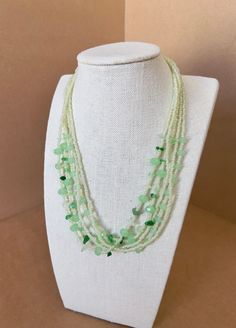 Pastel green necklace, mint green necklace, green crystal necklace, green boho necklace, gift for mom, stylish necklace, glass bead necklace *Beautiful necklace made green glass beads and crystal beads elements. * silver magnetic closure *It can be dressed up or worn more casually. Green Beaded Long Crystal Necklace, Long Green Beaded Crystal Necklace, Handmade Bohemian Green Emerald Necklace, Handmade Green Bohemian Emerald Necklace, Elegant Green Beaded Long Crystal Necklace, Green Faceted Beads Necklace For Gift, Green Beaded Long Necklace For Gift, Handmade Green Crystal Necklaces With Round Beads, Green Beaded Long Necklace As Gift