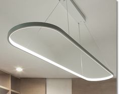 an overhead light fixture hangs from the ceiling