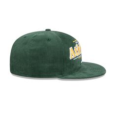 a green corded hat with the word lafca on it in gold letters