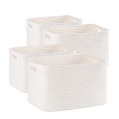 three white storage baskets with handles