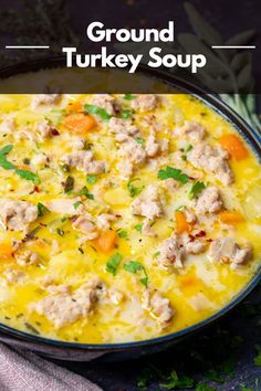 a bowl filled with ground turkey soup and garnished with parsley