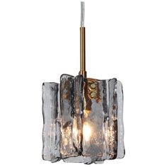 a light that is on some kind of metal fixture with ice cubes around it