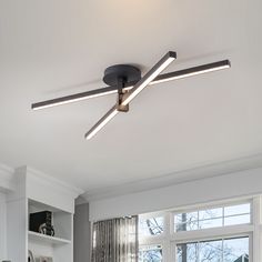 a modern ceiling light in a living room