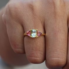 14k Solid Gold Jewelry Vintage Natural Tourmaline Ring, Cushion Cut Green & Tringle Hot Pink Tourmaline Wedding Gift Ring, Handmade Jewelry ≫ Features * Gemstone : 100% Natural Tourmaline Gemstone  * Cushion Cut Tourmaline Size : 7X5 MM  * Triangle Tourmaline Size : 5 MM  * 14k / 18k Solid Gold With Stamped  * 14K Solid Yellow Gold, ( Available in  14K Yellow Gold ,  14K Rose Gold & 14K White Gold ) * Option available in 18K Gold  * Size : All size available  * Ready to Ship in 1-2 Weeks ≫ FAQ b Gold Pink Sapphire Ring For Wedding, Pink Sapphire Gemstone Wedding Ring, Wedding Gold Pink Sapphire Ring, Gold Pink Sapphire Wedding Ring, Wedding Rings With Pink Sapphire And Accent Stones, Wedding Pink Sapphire Rings With Accent Stones, Fine Jewelry Three Stone Wedding Gemstones, Wedding Tourmaline Gemstones, Fine Jewelry Multi-stone Trillion Cut Ring