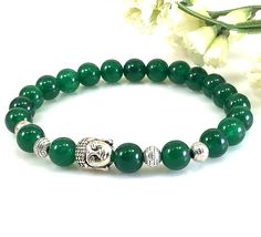 "✦Gemstone: Jade ✦Color: Green ✦Shape: Round ✦Length: 5''-9'' ✦Bead Size: Round Bead: 8mm ✦QTY: 1 pcs / package Please measure your wrist size, then order the bracelet. If you like our handmade product, please do not forget to add to our favorites. Thank you! This green jade is dyed color. Jade is a symbol of serenity and purity. It signifies wisdom gathered in tranquility. It increases love and nurturing. A protective stone, Jade keeps the wearer from harm and brings harmony. Jade attracts good Green Jade Bracelet, Girly Bracelets, Color Jade, Jade Color, Good Luck Bracelet, Chakra Bracelet, Boho Bracelet, Jade Bracelet, Bracelet Crafts