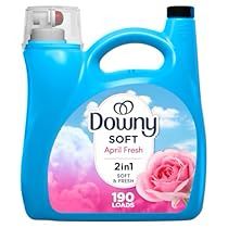 downy soft liquid with pink rose on the front and blue bottle next to it