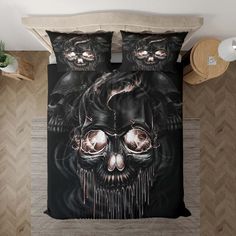 a bed with a skull and two skulls on it