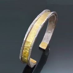 Gold & Silver Bracelet - Elegantly textured, this forged and hammered cuff bracelet is fabricated in sterling silver,18K yellow gold, and sterling silver bimetal. Hammered Cuff Bracelet, Gold And Silver Bracelets, Jewelry Artist, Artful Home, Artistic Jewelry, Precious Metals, Cuff Bracelet, Silver Gold, Silver Bracelet