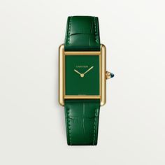 Cartier - Tank Louis Cartier watch - Watch Gold/Gold/Leather - Tank Louis Cartier watch, large model, Manufacture mechanical movement with manual winding. 18K yellow gold (750/1000) case, beaded crown set with a sapphire cabochon. Green lacquer-effect dial, gold-finish steel sword-shaped hands, mineral crystal. Semi-matte green alligator-skin strap, 18K yellow gold (750/1000) ardillon buckle. Case dimensions: 33.7 mm x 25.5 mm. Thickness: 6.6 mm. Water-resistant up to 3 bar (approx. 30 meters/100 feet). Cartier Green Watch, Cartier Watch Stack, Tank Louis Cartier, Green Lacquer, Beaded Crown, Sapphire Cabochon, Green Watch, Matte Green, Alligator Skin