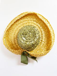 Lovely midcentury summer hat - Wide, upturned yellow straw brim - Tall green straw crown wrapped with matching green grosgrain ribbon - Bow at back - Grosgrain ribbon band inside - Label: Reproduction of Paulette Green Straw Hat For Kentucky Derby Beach, Green Straw Hat For Kentucky Derby Vacation, Yellow Straw Sun Hat With Short Brim, Yellow Straw Hat With Short Brim, Green Brimmed Boater Hat For Summer, Green Boater Hat With Curved Brim For Summer, Green Fedora Straw Hat For Kentucky Derby, Green Brimmed Straw Hat For Garden Party, Yellow Straw Sun Hat For Spring