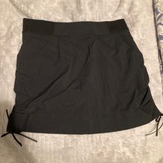 Great Black Columbia Skirt/Skort. Brand New With Tags. Sporty Black Relaxed Skort, Black Nylon Short Skort, Casual Black Nylon Skort, Black Sporty Lined Skirt, Sporty Black Lined Mini Skirt, Sporty Black Lined Skirt, Black Nylon Skirt, Casual Black Stretch Swim Skirt, Black Skort With Built-in Shorts For Spring