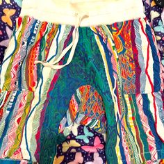 This Shorts Is In Used Condition Its My Favorite Shorts Might Not Sell It Just Putting It Out There Its A Size Medium The Tag Is Fading And The Waisted Part Also Has Some Discoloration But Its In Still Great Condition Multicolor Relaxed Fit Cotton Bottoms, Multicolor Cotton Summer Pants, Multicolor Loungewear Bottoms For Summer, Multicolor Patchwork Relaxed Fit Bottoms, Green Patchwork Bottoms For Vacation, Casual Patchwork Bottoms For Loungewear, Multicolor Cotton Shorts With Elastic Waistband, Multicolor Elastic Waistband Short Bottoms, Multicolor Short Bottoms With Elastic Waistband