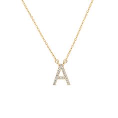 Suzy Levian 14K Yellow Gold .10ctw Diamond Letter Initial Necklace Suzy Levian believes that, together, we can inspire the world to appreciate the diamonds in ourselves. That notion inspires this initial necklace, a modern statement piece featuring a block letter drop that shines with hand-set diamonds. Perfect for letting someone special know that you're thinking of them. And a sweet gift to give yourself, too.         Approx. 18"L x 0.19"W     Stamped 14K yellow gold; polished finish      Cabl Yellow Gold Pendant Initial Necklace With Diamond Accents, Luxury Diamond Initial Necklace As A Gift, Luxury Diamond Initial Necklace For Gift, Elegant Personalized Diamond White Necklace, Timeless Personalized Diamond Jewelry, Dainty Diamond Birthstone Necklace For Anniversary, Yellow Gold Initial Pendant Necklace With Brilliant Cut, Personalized Diamond Necklace In White Gold, Yellow Gold Brilliant Cut Initial Pendant Necklace