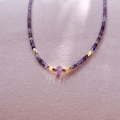 Beaded AMETHYST layering necklace 18k gold plated. Natural gemstone necklace with gold beads This sparkly and remarkable beaded necklace effortlessly blends bohemian and contemporary styles, making it a versatile accessory for any occasion 🌟 This beaded necklace features a beautiful purple dainty amethyst beads carefully handcrafted in our jewellery studio in Melbourne. Style this necklace/ choker with your favourite necklaces or let it shine solo. 💎💎 Excellent choice as a gift for birthday, Gold Gemstone Beads Jewelry Gift For Her, Dainty Gold Plated Crystal Necklace For Gift, Handmade Purple Jewelry In 14k Gold Filled, 14k Gold Filled Spiritual Necklaces As Gift, Gold Jewelry With Gemstone Beads For Her, Gold Amethyst Necklace For Healing, Bohemian Gemstone Necklaces As Gift For Her, Adjustable Dainty Crystal Necklace With Faceted Beads, Dainty Adjustable Gold-plated Necklace