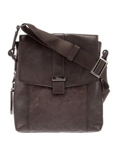 Tumi Messenger BagBrown LeatherGunmetal HardwareSingle Shoulder StrapDual Exterior PocketsNylon Lining & Dual Interior PocketsFlap Closure at FrontUnfortunately, due to restrictions, this item may not be eligible for shipping in all areas. Tumi Backpack Women, Anti-theft Leather Bag Rectangular, Tumi Backpack For Men, Tumi Carson Backpack, Tumi Voyageur Backpack, Belt Shop, Flat Sneakers, Leather Messenger Bag, Designer Gifts