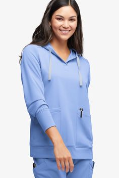 Who doesn’t love a hoodie? So comfortable – and it keeps chills off your head and neck. Here, rib-knit cuffs and bottom add extra softness. Every style in our Resurge collection is thoughtfully designed and responsibly sourced. Made of 100% recycled polyester (the most of any scrubs brand!), plus recycled trims and zippers. Even the bag it comes in is recycled. Long story short: Resurge lets you feel good and do good • Recycled fiber from approximately 21 plastic bottles • Modern fit • Hoodie st Hooded Tops With Pockets For Outdoor Activities, Hoodie With Kangaroo Pocket, Athleisure Hoodie With Pockets For Outdoor Activities, Solid Color Hoodie With Pockets For Outdoor Activities, Hoodie With Pockets For Outdoor Activities, Athleisure Hoodie Top With Pockets, Solid Long Sleeve Activewear With Pockets, Sporty Hoodie Tops With Pockets, Stretch Hooded Tops With Pockets