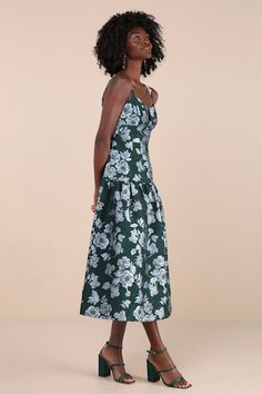 Let everyone know you're an elegant babe from the moment you arrive in the Lulus Major Flirtation Emerald Floral Jacquard Drop Waist Midi Dress! Sleek woven fabric (with a blue-toned floral jacquard) shapes this elevated dress that has adjustable straps and a sweetheart-style neckline with seamed cups and a hidden U-bar support. Fitted silhouette continues into a drop waist that falls to a flaring midi hem. Hidden zipper/clasp at back. Fit: This garment fits true to size. Length: Mid-calf length Evening Floral Jacquard Midi Dress, Evening Floral Print Jacquard Midi Dress, Evening Jacquard Midi Dress With Floral Print, Floral Print Jacquard Midi Dress, Midi Length Jacquard Dress With Floral Print, Elegant Jacquard Midi Dress With Floral Print, Floral Print Jacquard Dresses For Wedding, Floral Jacquard Dresses For Weddings, Elegant Green Jacquard Dresses