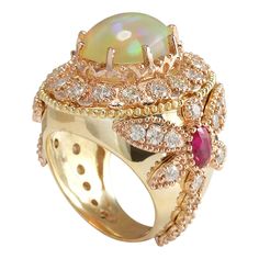 Stamped: 14K Yellow GoldTotal Ring Weight: 17.7 GramsRing Length: N/ARing Width: N/AGemstone Weight: Total Natural Opal Weight is 3.82 Carat (Measures: 14.79x11.66 mm)Color: MulticolorGemstone Weight: Total Natural Ruby Weight is 1.24 CaratColor: RedDiamond Weight: Total Natural Diamond Weight is 2.65 CaratColor: F-G, Clarity: VS2-SI1Face Measures: 26.50x23.60 mmSku: [704156W] Yellow Gold Diamond Ring, Gold Diamond Ring, Gold Diamond Rings, Natural Ruby, Natural Opal, Natural Diamonds, Gold Diamond, Bracelet Watch, Diamond Ring