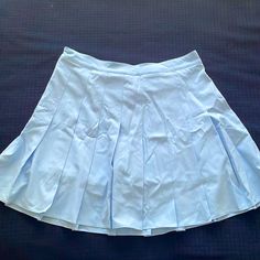 Blue Pleated Tennis Mini Skirt. Polyester Spandex Blend. White Shorts Underneath. Side Zipper. Higher Rise. Hits Above The Knee. Never Worn. True To Size. And Super Cute. :) Blue Pleated Mini Skirt, Tennis Mini Skirt, Pleated Mini Skirt, Above The Knee, Polyester Spandex, Side Zipper, The Knee, White Shorts, Mini Skirt