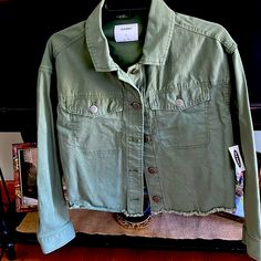 Brand New Never Worn Army Style Jean Jacket Casual Long Sleeve Cropped Jacket For Day Out, Trendy Green Button-up Utility Jacket, Green Cropped Jacket With Pockets For Fall, Casual Cropped Outerwear For Day Out, Trendy Green Collared Utility Jacket, Green Collared Trendy Utility Jacket, Green Collared Utility Jacket For Spring, Casual Green Utility Jacket For Spring, Casual Khaki Cropped Jacket With Long Sleeves