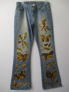 "HAND-EMBELLISHED Abecrombie & Fitch Butterfly Design Embellished JEANS ✽ ✽ ✽ Original Butterfly Print Design, Hand-embellished by Iva Boutique ✽ ✽ ✽ BRAND - Abecrombie & Fitch SIZE - 6 Tall MATERIAL  ---- 72% cotton 25% Polyester 3% cotton LINING - 97% polyester 3% spandex WAIST------------30\" HIPS ------------ 38\" RISE ------------- 11\" INSEAM -------- 32 1/2\" PATTERN ------- butterflyl print CONDITION ----- nwt MATERIAL ------- sequin & glue glitter CLOSURE ------- front zipper PACKETS -- Spring Denim Blue Jeans With Rhinestones, Spring Rhinestone Denim Blue Jeans, Casual Denim Rhinestone Jeans, Casual Denim Blue Jeans With Rhinestones, Fitted Embellished Bottoms For Fall, Denim Blue Straight Leg Jeans With Rhinestones, Denim Blue Rhinestone Straight Leg Jeans, Embellished Denim Blue Straight Leg Bottoms, Fall Embellished Straight Leg Bottoms